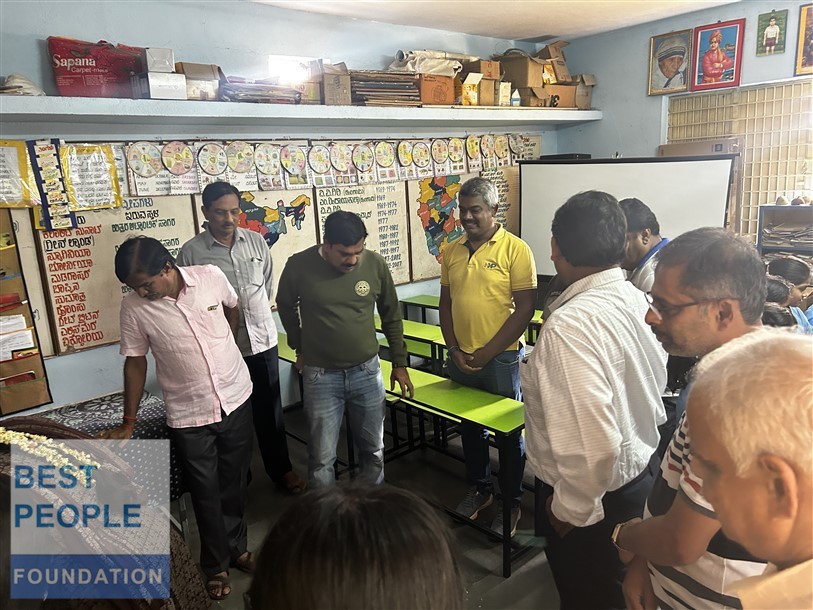 Students smiling while using the new computers