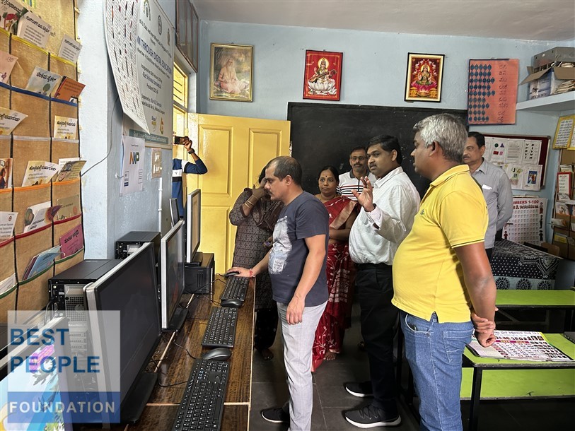Students excitedly watching the computer setup